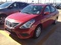 Red Brick 2015 Nissan Versa 1.6 S Sedan