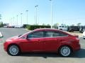 2013 Ruby Red Ford Focus Titanium Sedan  photo #2