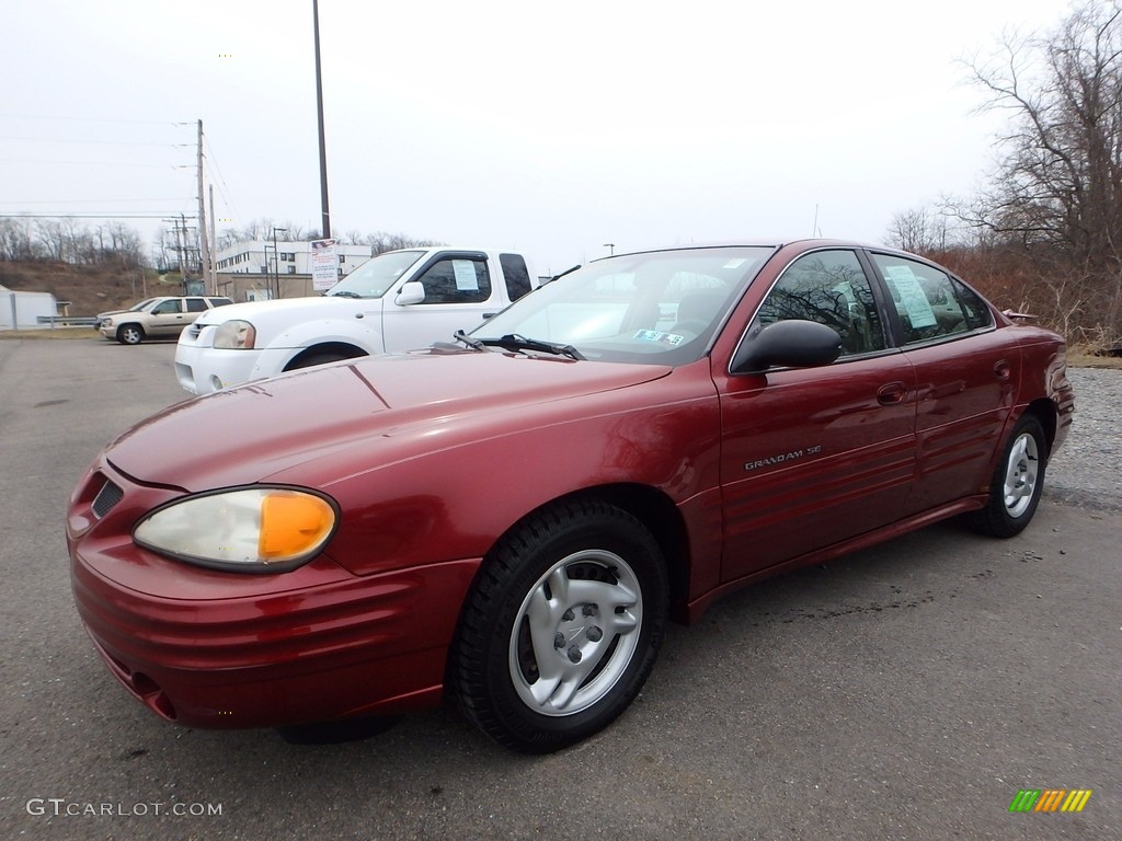 2002 Grand Am SE Sedan - Redfire Metallic / Dark Taupe photo #1