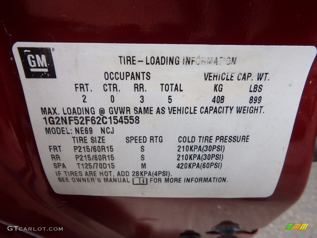 2002 Grand Am SE Sedan - Redfire Metallic / Dark Taupe photo #14
