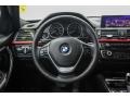 Black 2013 BMW 3 Series 328i xDrive Sedan Steering Wheel