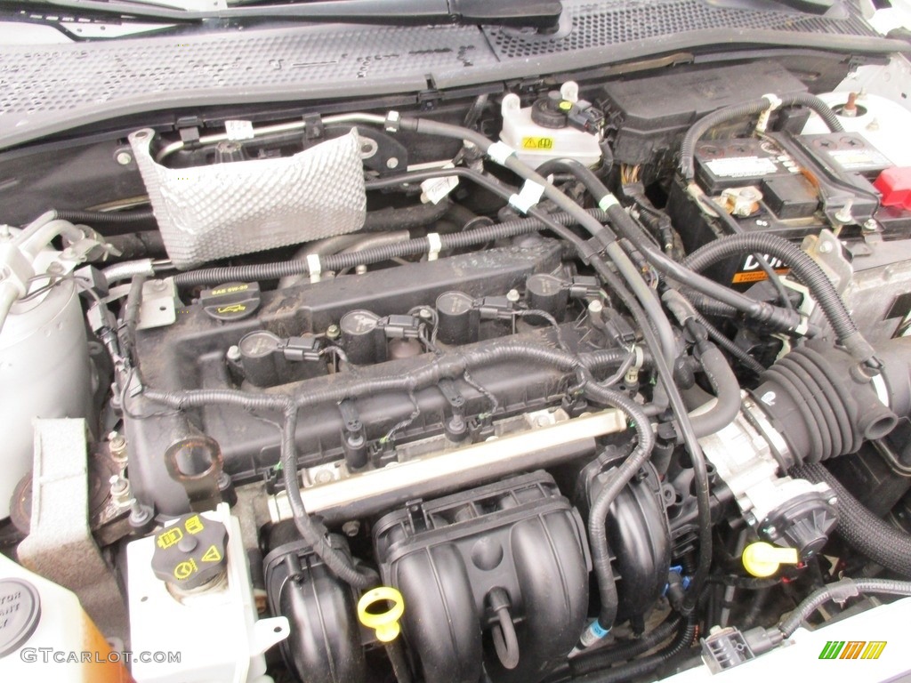2009 Focus SE Sedan - White Suede / Medium Stone photo #16