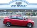 2014 Ruby Red Ford Focus SE Sedan  photo #1