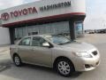 2010 Desert Sand Metallic Toyota Corolla LE  photo #2