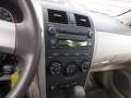 2010 Desert Sand Metallic Toyota Corolla LE  photo #13