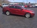 2014 Ruby Red Ford Taurus SEL  photo #1