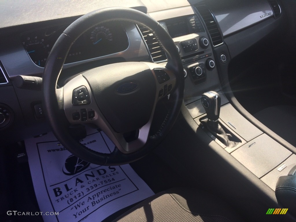 2014 Taurus SEL - Ruby Red / Charcoal Black photo #8