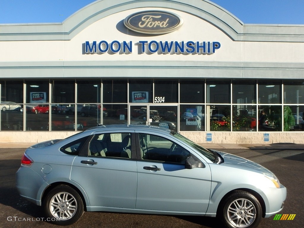 2009 Focus SE Sedan - Light Ice Blue Metallic / Medium Stone photo #1