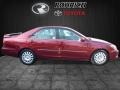 2003 Salsa Red Pearl Toyota Camry XLE  photo #2