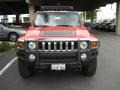 2006 Victory Red Hummer H3   photo #2