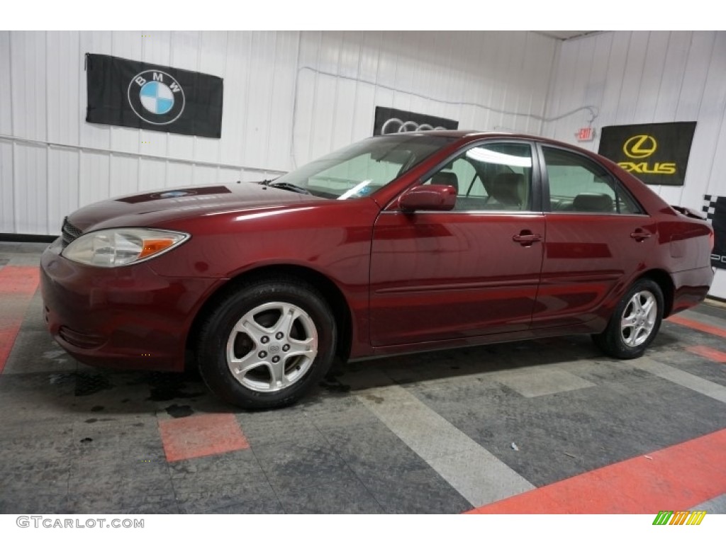 2004 Camry LE - Salsa Red Pearl / Stone photo #2