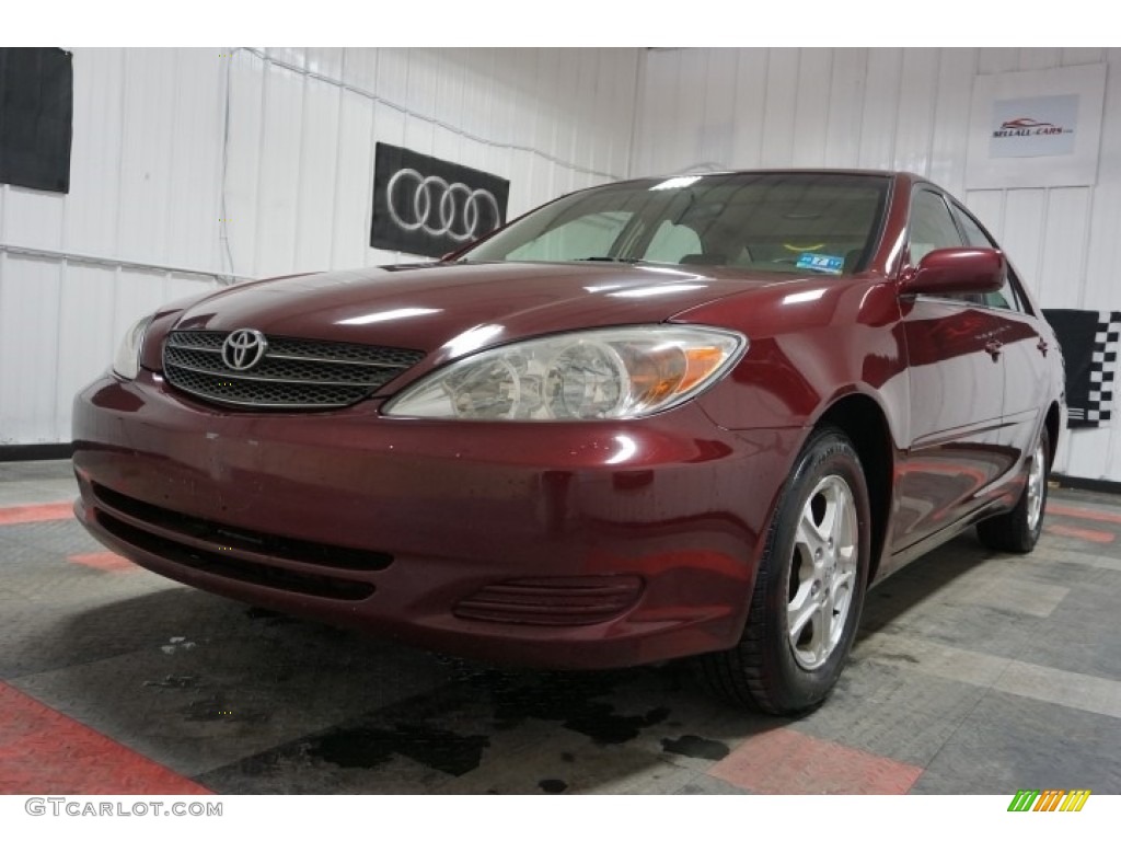 2004 Camry LE - Salsa Red Pearl / Stone photo #3