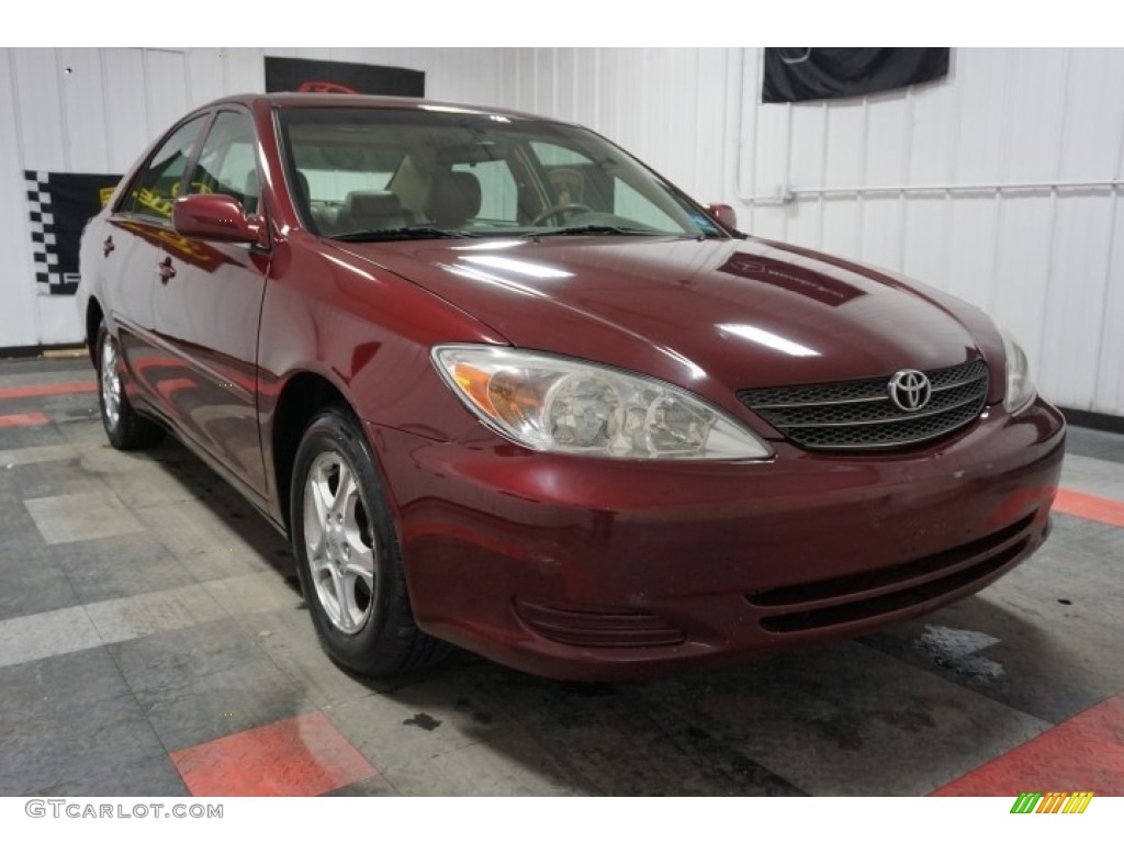 2004 Camry LE - Salsa Red Pearl / Stone photo #5
