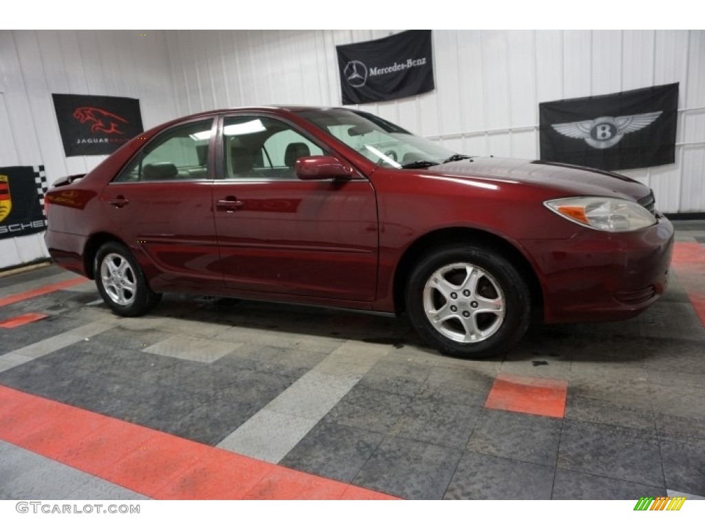 2004 Camry LE - Salsa Red Pearl / Stone photo #6