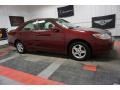 2004 Salsa Red Pearl Toyota Camry LE  photo #6
