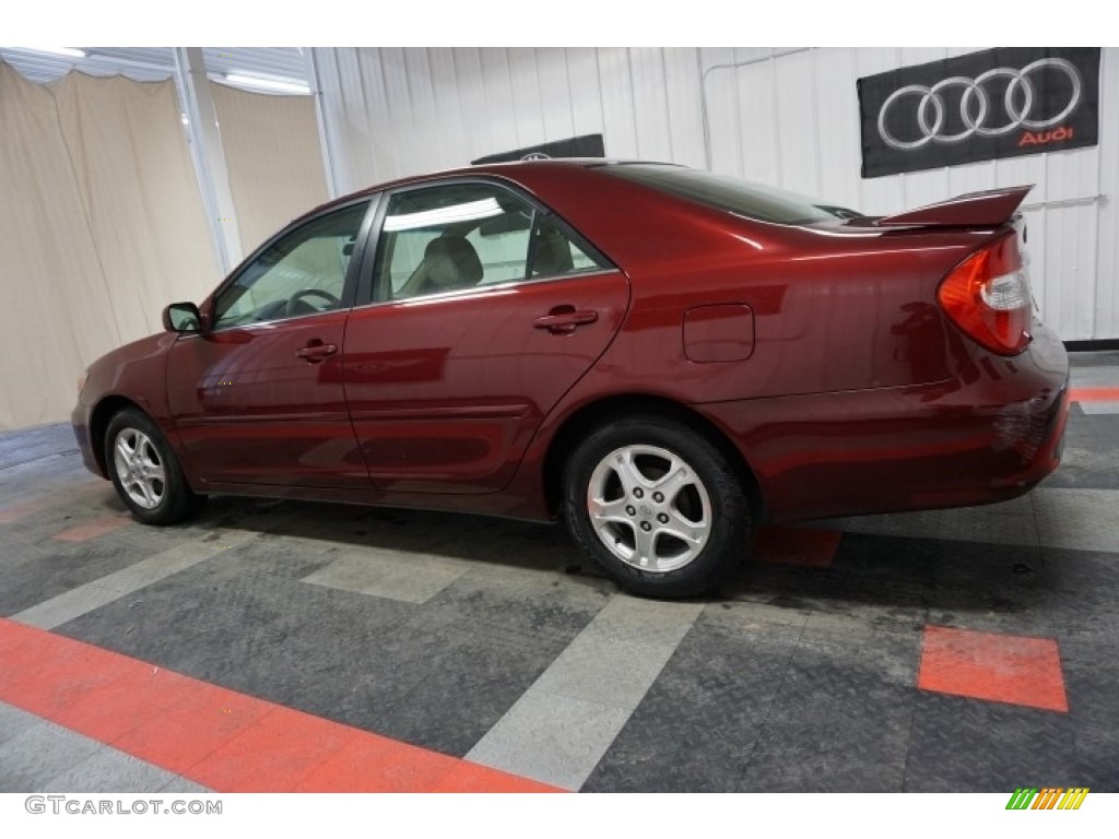 2004 Camry LE - Salsa Red Pearl / Stone photo #11