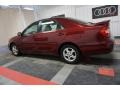 2004 Salsa Red Pearl Toyota Camry LE  photo #11