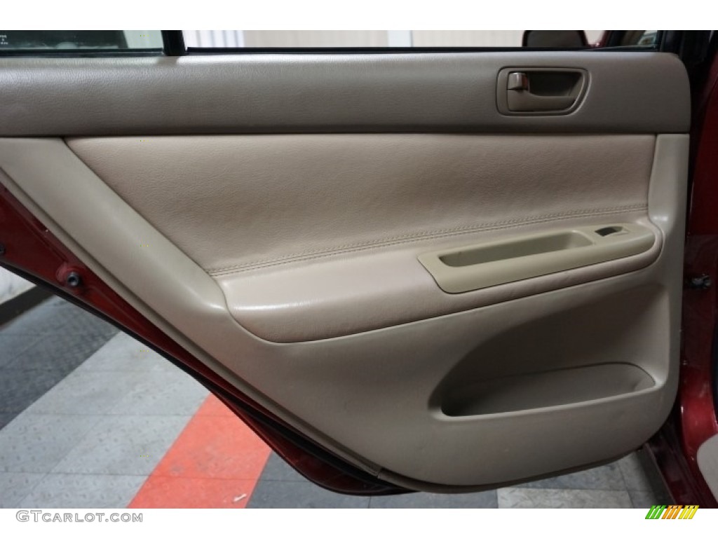 2004 Camry LE - Salsa Red Pearl / Stone photo #16