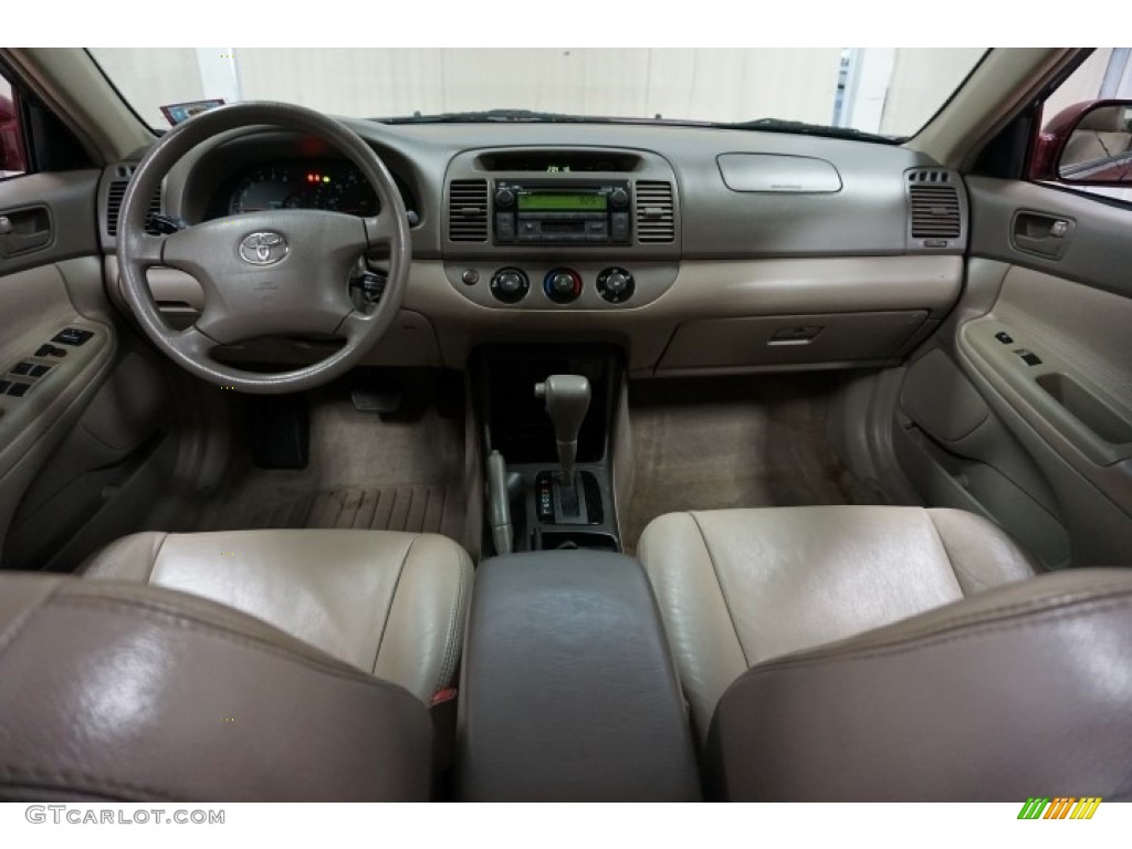 2004 Camry LE - Salsa Red Pearl / Stone photo #27