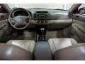 2004 Salsa Red Pearl Toyota Camry LE  photo #27