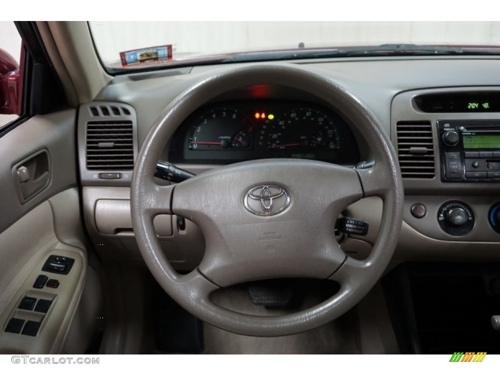 2004 Camry LE - Salsa Red Pearl / Stone photo #29