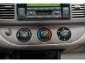 2004 Salsa Red Pearl Toyota Camry LE  photo #37