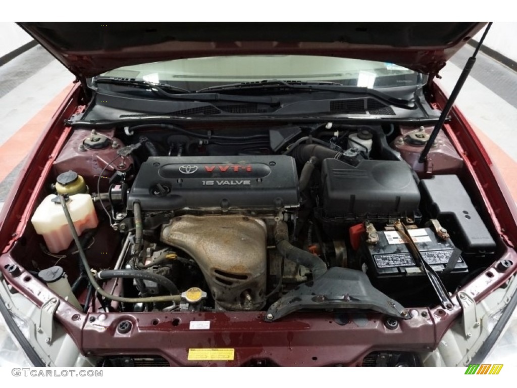 2004 Camry LE - Salsa Red Pearl / Stone photo #44