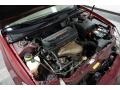 2004 Salsa Red Pearl Toyota Camry LE  photo #46