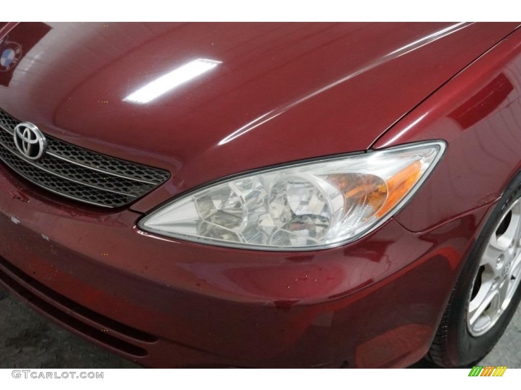 2004 Camry LE - Salsa Red Pearl / Stone photo #48