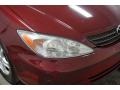 2004 Salsa Red Pearl Toyota Camry LE  photo #49