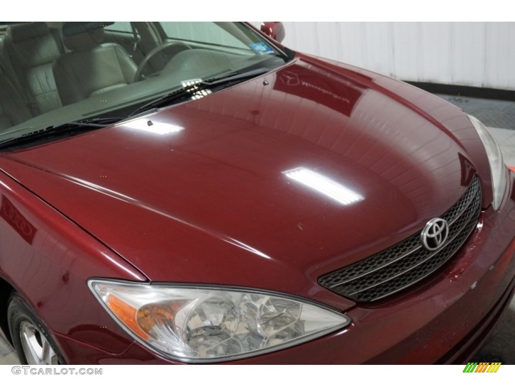 2004 Camry LE - Salsa Red Pearl / Stone photo #51
