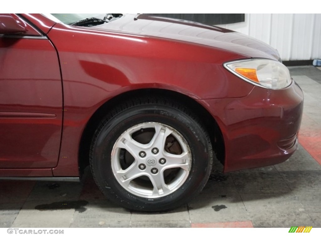 2004 Camry LE - Salsa Red Pearl / Stone photo #54