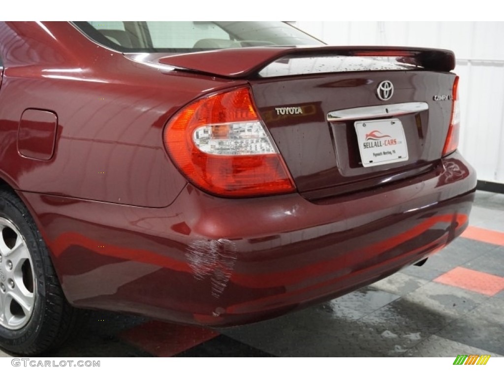 2004 Camry LE - Salsa Red Pearl / Stone photo #67