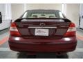 2004 Salsa Red Pearl Toyota Camry LE  photo #70