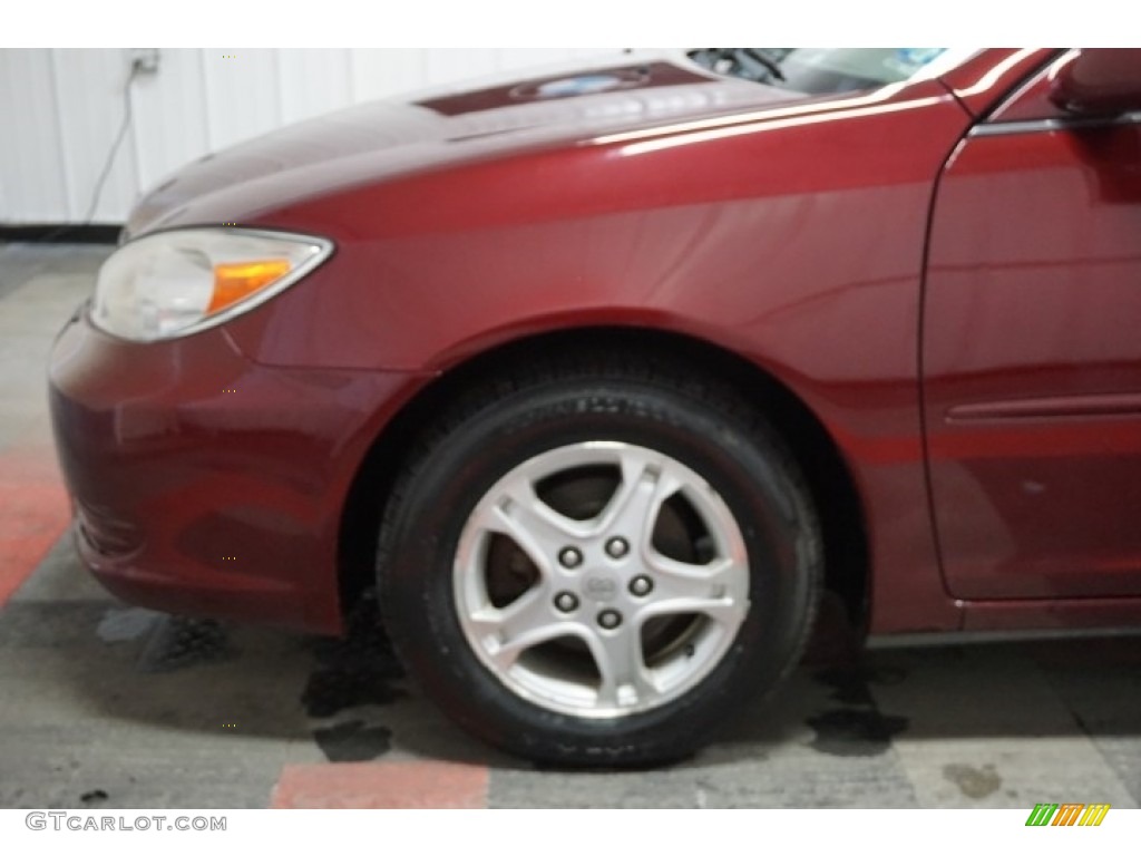 2004 Camry LE - Salsa Red Pearl / Stone photo #78