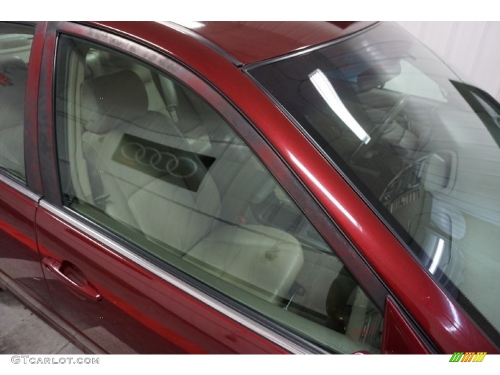 2004 Camry LE - Salsa Red Pearl / Stone photo #90