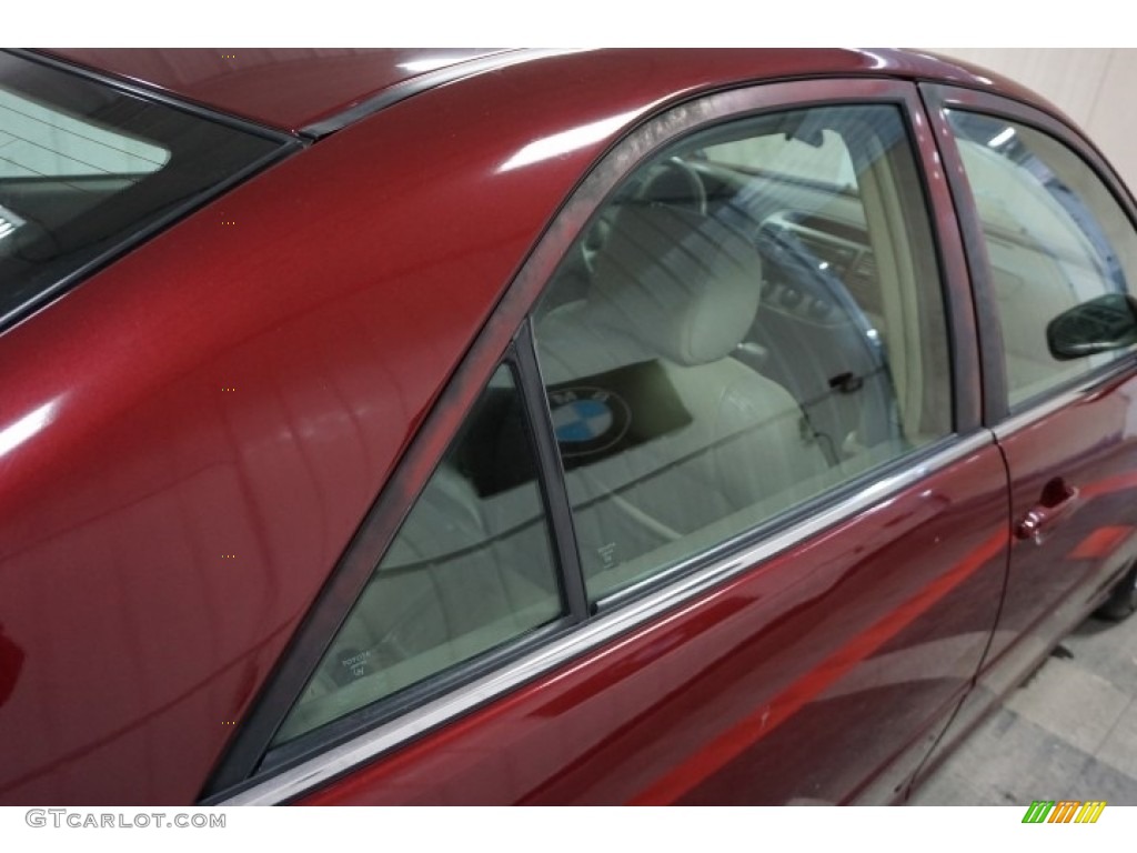 2004 Camry LE - Salsa Red Pearl / Stone photo #92