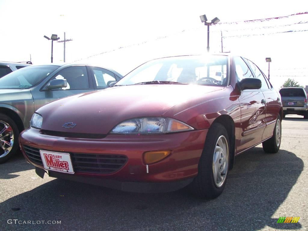 1996 Cavalier Sedan - Cayenne Red Metallic / Dark Gray photo #1