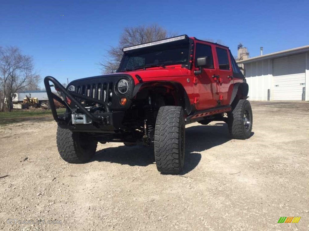 Flame Red 2009 Jeep Wrangler Unlimited X 4x4 Exterior Photo #112194885