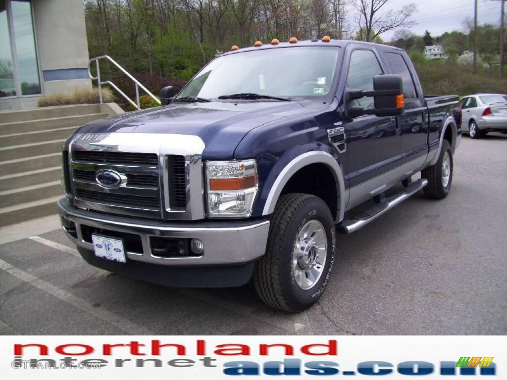 2009 F250 Super Duty Lariat Crew Cab 4x4 - Dark Blue Pearl Metallic / Medium Stone photo #7