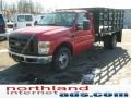 Red 2009 Ford F350 Super Duty XL Regular Cab Chassis Stake Truck