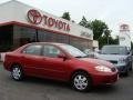 2006 Impulse Red Pearl Toyota Corolla LE  photo #1