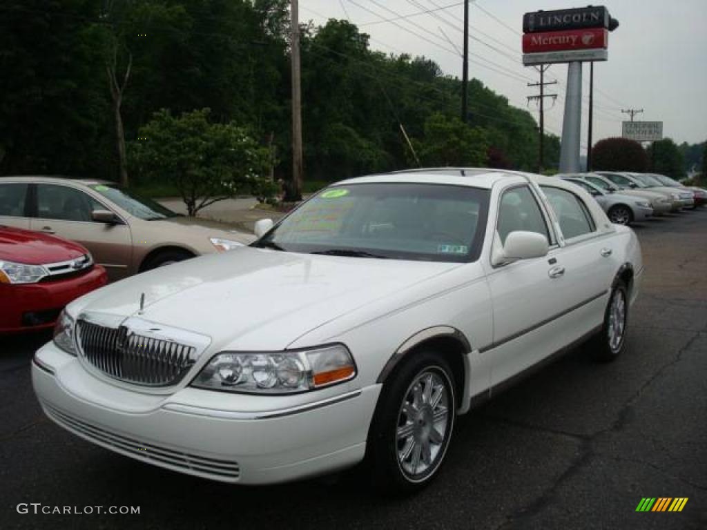 Vibrant White Lincoln Town Car