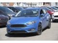 2016 Blue Candy Ford Focus SE Hatch  photo #1