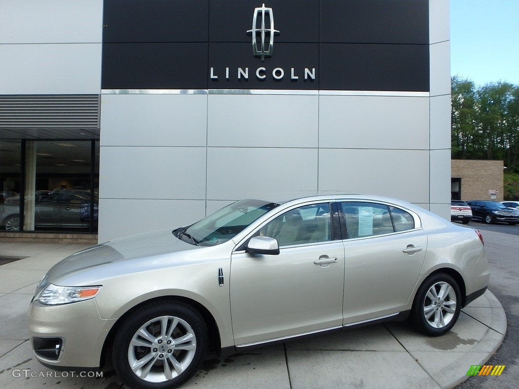 2011 MKS AWD - Gold Leaf Metallic / Light Camel photo #1