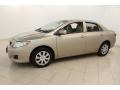 2010 Desert Sand Metallic Toyota Corolla LE  photo #3