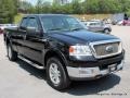 2004 Black Ford F150 Lariat SuperCab 4x4  photo #7