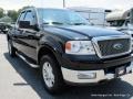 2004 Black Ford F150 Lariat SuperCab 4x4  photo #31