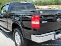 2004 Black Ford F150 Lariat SuperCab 4x4  photo #33