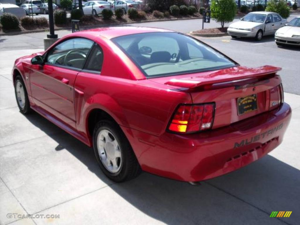 2001 Mustang V6 Coupe - Laser Red Metallic / Medium Parchment photo #7